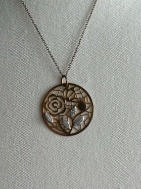 Sterling silver necklace plated in gold with cubic zirconia leaves